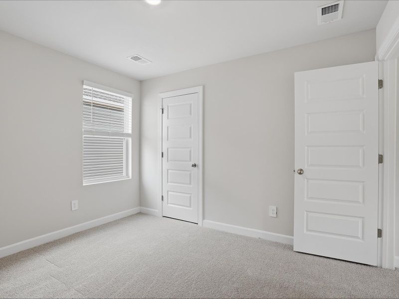 Spacious, unfurnished interior of a new home in Brayfield Manor - Heritage Collection, Wellford (Image 18).