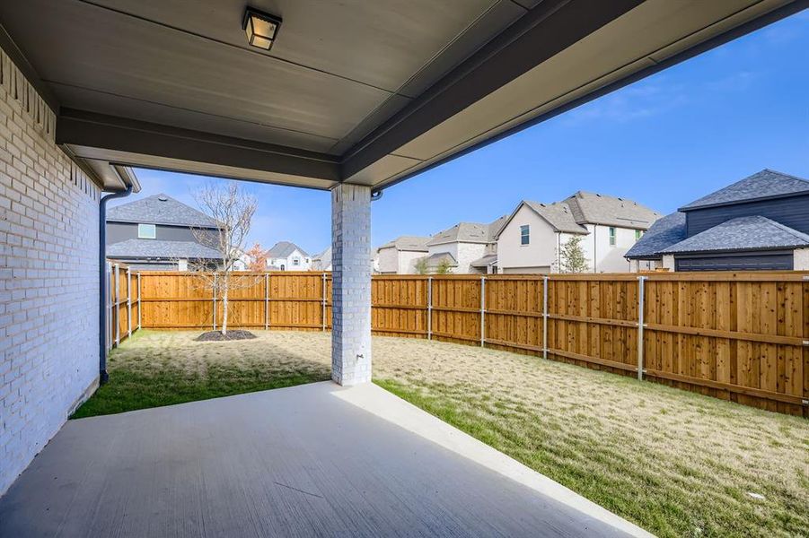 Exterior details and patio area of a home in Mosaic 40s, Prosper (Image 22).
