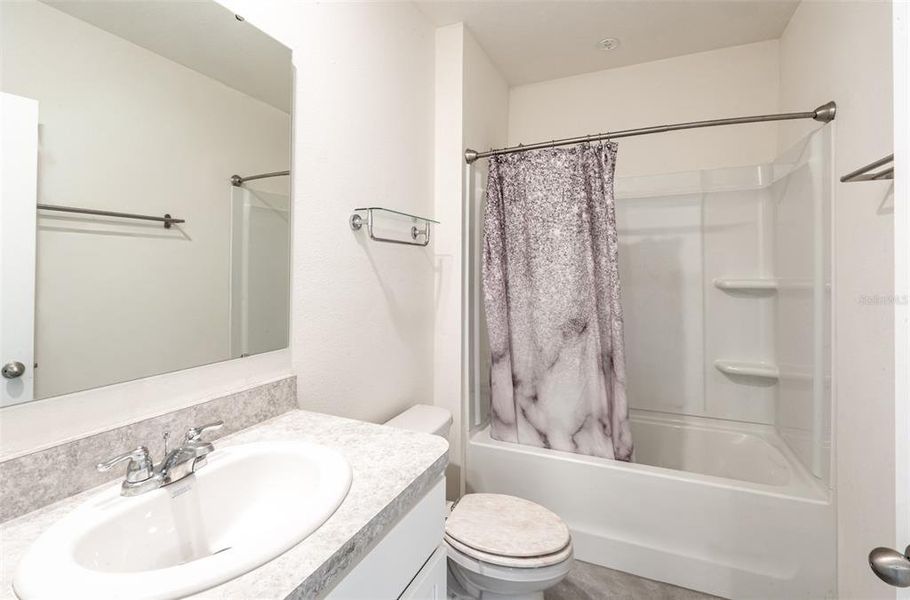 Furnished interior view inside a new home in Poinciana Enclave, Kissimmee (Image 17).