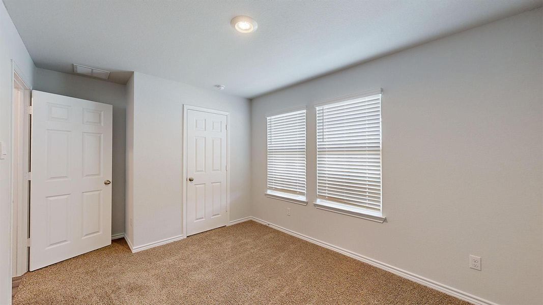 Spacious, unfurnished interior of a new home in Creekfall, Burnet (Image 20).