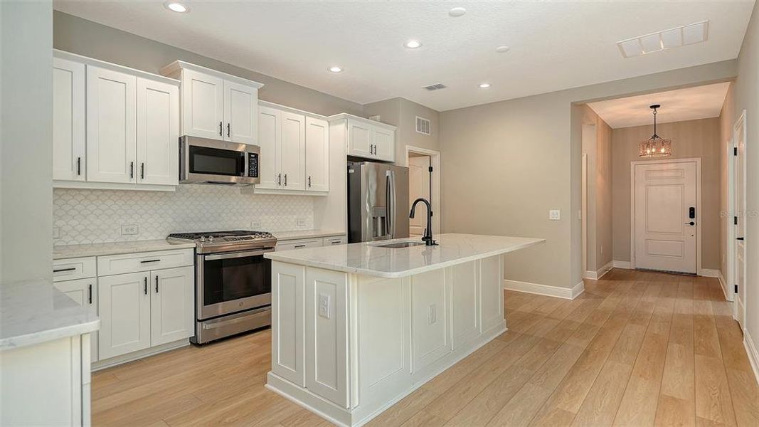Furnished interior view inside a new home in , Englewood (Image 9). Furnished interior view inside a new home in , Englewood (Image 9).