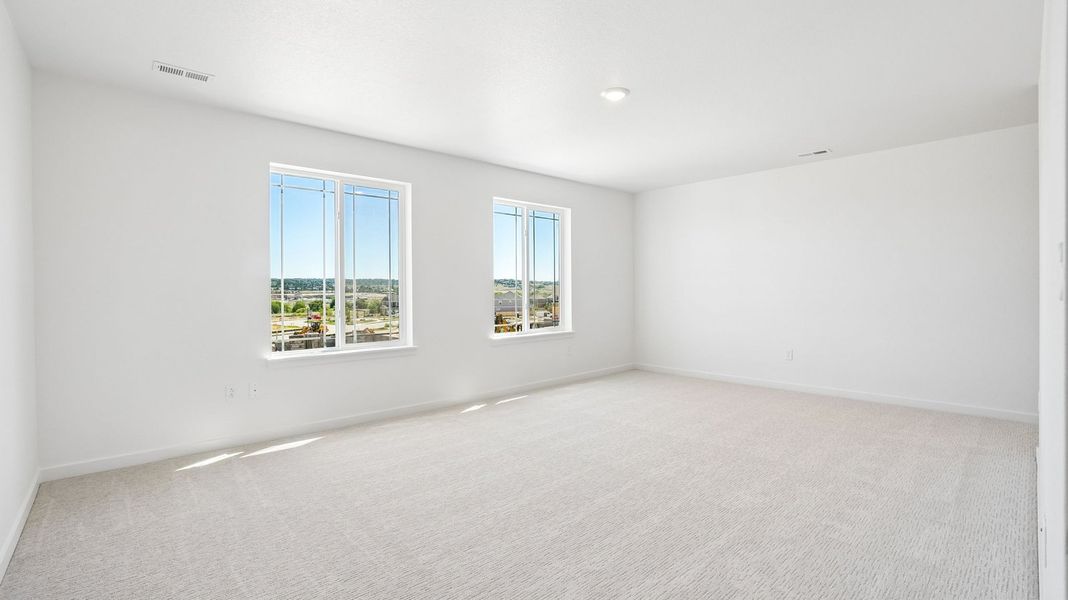 Spacious, unfurnished interior of a new home in Trails at Crowfoot, Parker (Image 14).