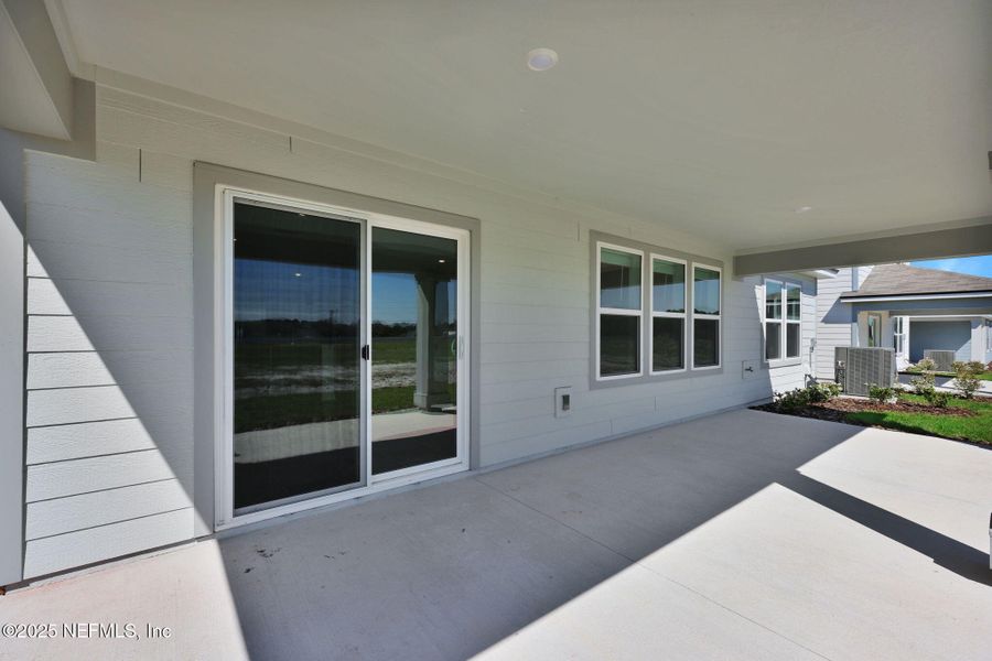 Exterior details and patio area of a home in Wells Landing, Jacksonville (Image 2). Exterior details and patio area of a home in Wells Landing, Jacksonville (Image 2).