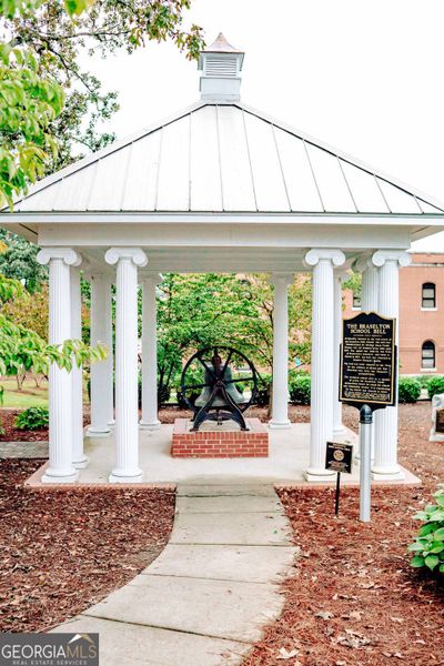 Front exterior of a new home in Rosewood Lake Estates, Hoschton, GA, highlighting curb appeal (Image 70).