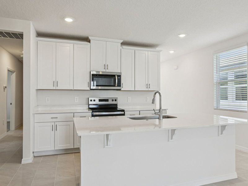 Furnished interior view inside a new home in Springs at Lake Alfred - Classic Series, Lake Alfred (Image 4).