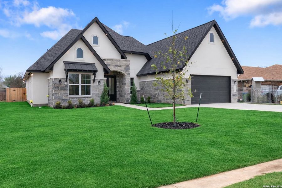 Front exterior of a new home in , Selma, TX, highlighting curb appeal (Image 21).