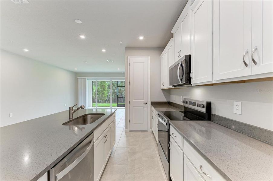 Furnished interior view inside a new home in Wellen Park, Venice (Image 16).