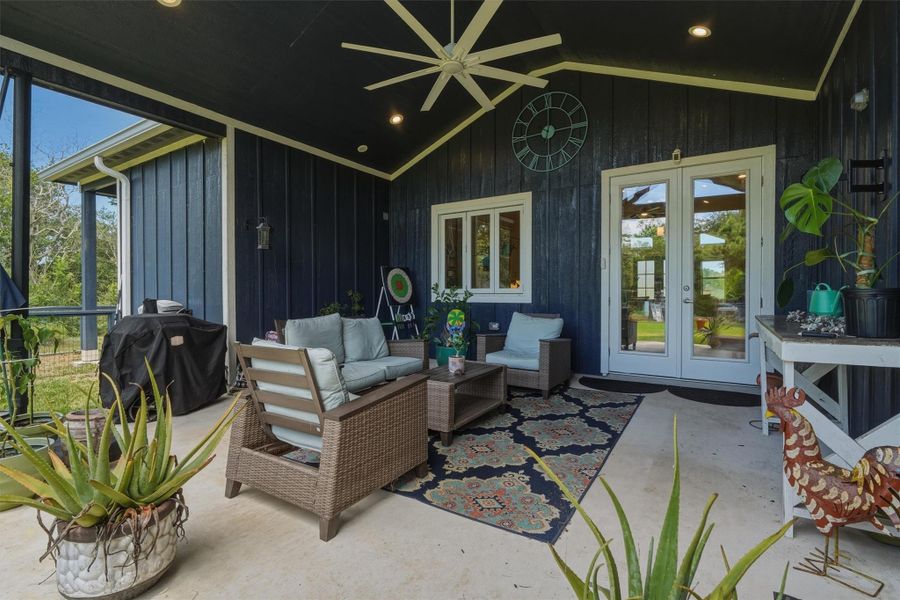 Beautiful covered back patio with large fan to beat the Texas Heat! Accordion windows between kitchen and patio. Beautiful covered back patio with large fan to beat the Texas Heat! Accordion windows between kitchen and patio.