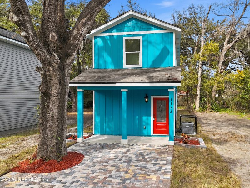 Front exterior of a new home in , Jacksonville, FL, highlighting curb appeal (Image 18).