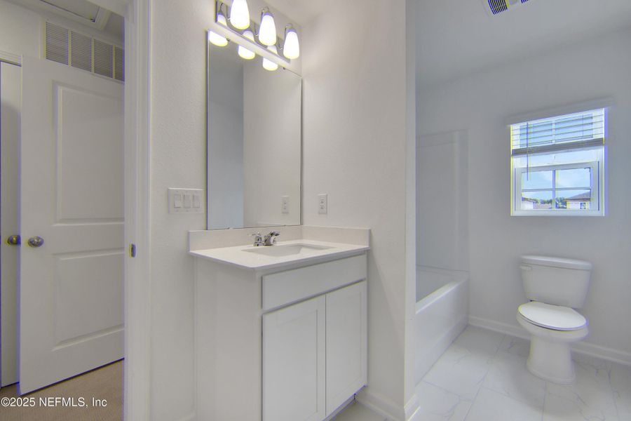 Furnished interior view inside a new home in Cordova Palms, St. Augustine (Image 8).