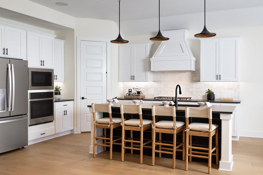 Representative furnished interior of a home built from the Ethan by Tri Pointe Homes in Union Park, Little Elm (Image 13).