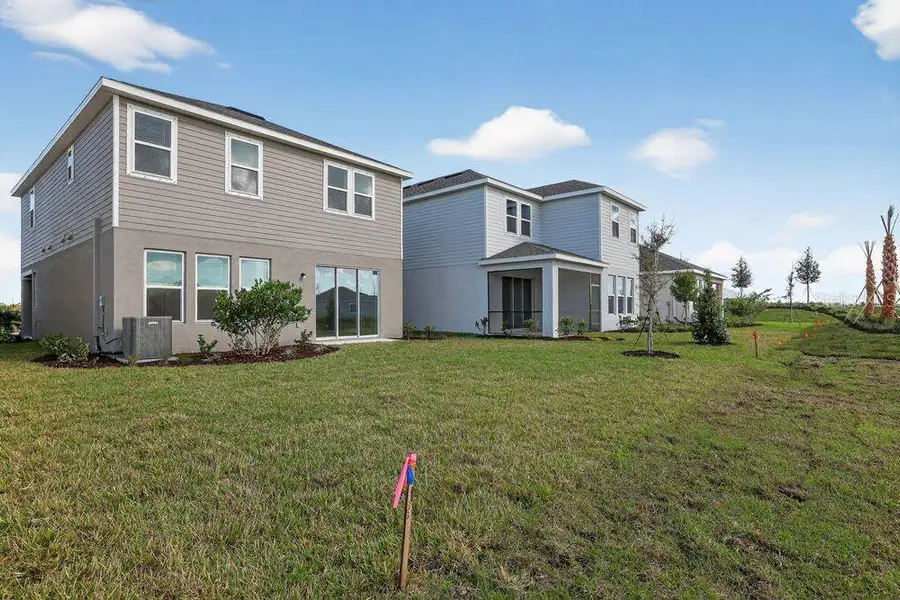 Exterior details and patio area of a home in Firethorn, Parrish (Image 3).