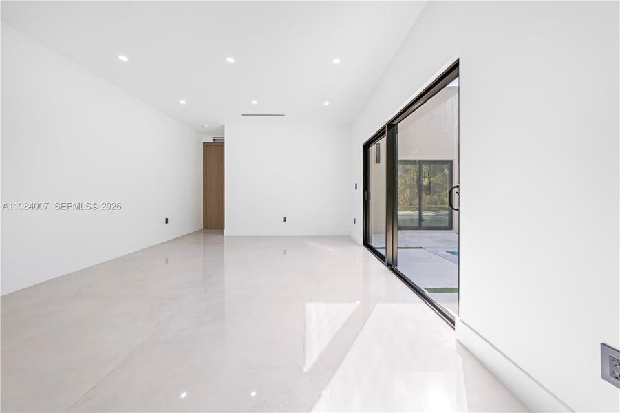 Spacious, unfurnished interior of a new home in , North Miami (Image 60).