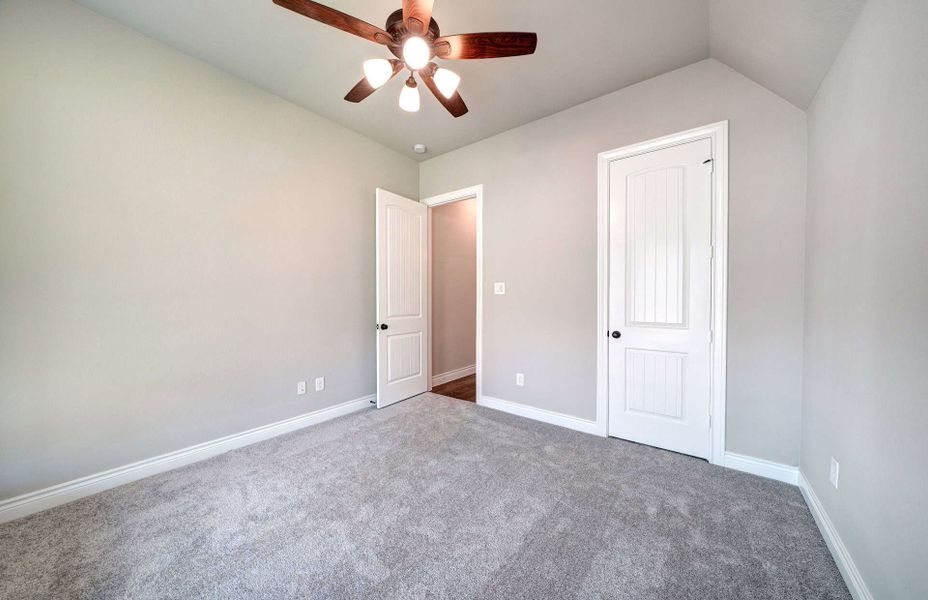 Representative unfurnished interior of a home built from the 3030 by Ravenna Homes in The Woodlands Hills 65′, Willis (Image 43). Representative unfurnished interior of a home built from the 3030 by Ravenna Homes in The Woodlands Hills 65′, Willis (Image 43).