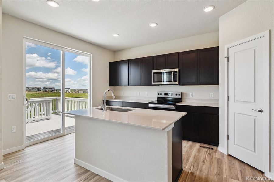 Furnished interior view inside a new home in Spring Valley Ranch, Elizabeth (Image 9).