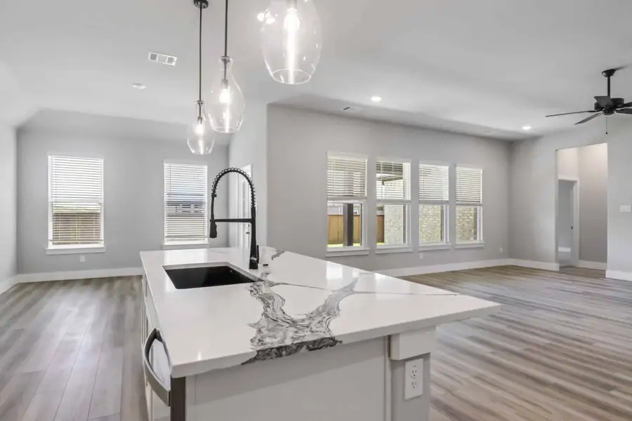Representative furnished interior of a home built from the The Teton by Lillian Custom Homes in Polo Ridge, Heath (Image 7).