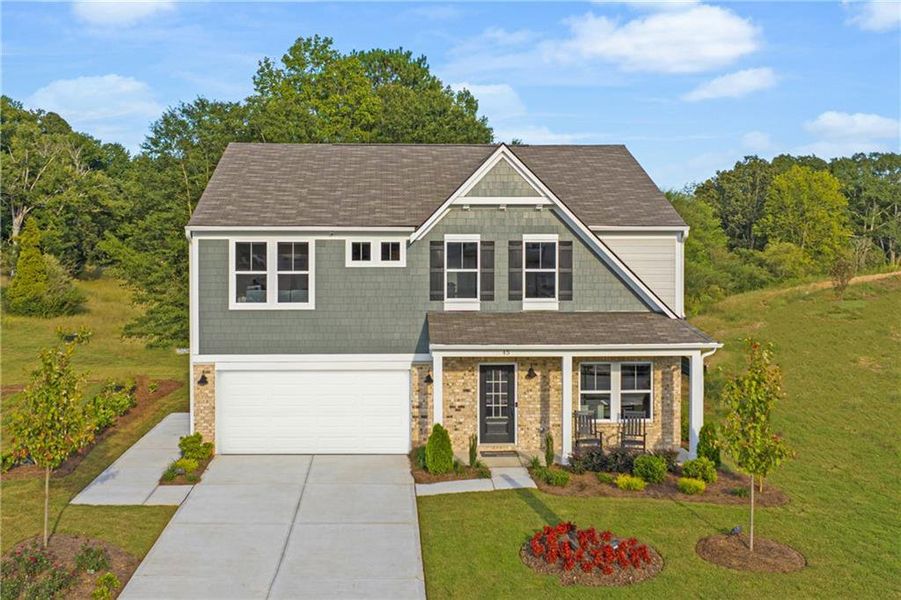 Front exterior of a new home in Crossvine Estates, Braselton, GA, highlighting curb appeal (Image 1). Front exterior of a new home in Crossvine Estates, Braselton, GA, highlighting curb appeal (Image 1).