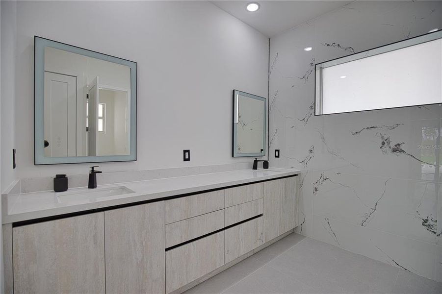 Master bathroomwith gold details Master bathroomwith gold details