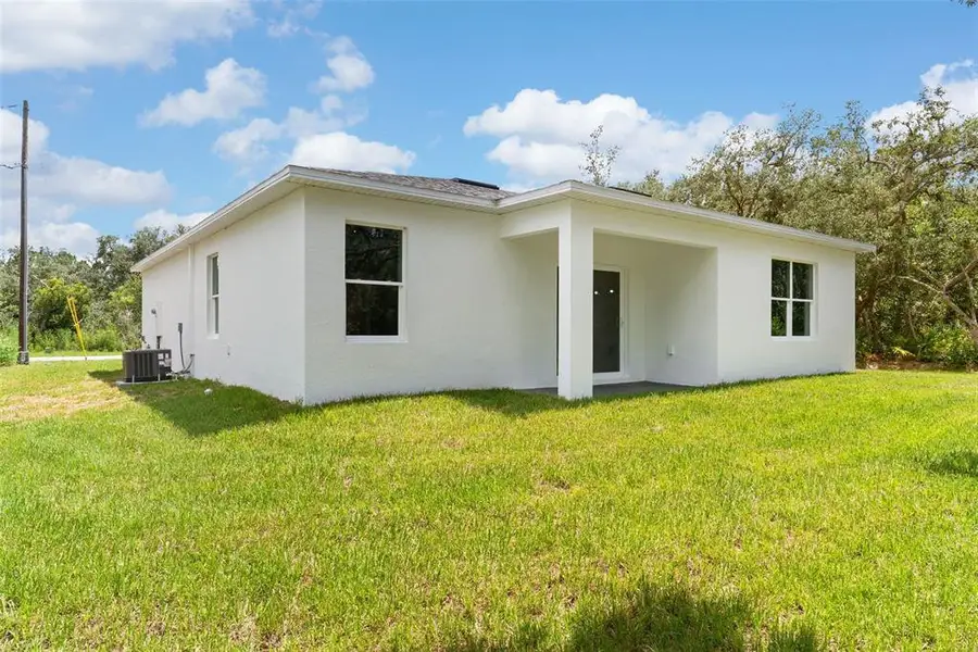 Exterior details and patio area of a home in , Poinciana (Image 3).