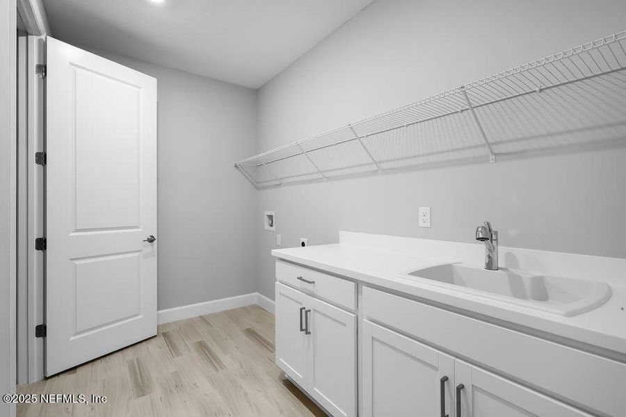 Furnished interior view inside a new home in Colbert Landings, Palm Coast (Image 14).