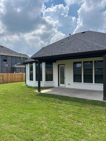 Front exterior of a new home in Katy Court, Katy, TX, highlighting curb appeal (Image 2). Front exterior of a new home in Katy Court, Katy, TX, highlighting curb appeal (Image 2).