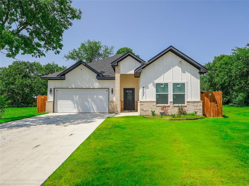 Front exterior of a new home in , Dallas, TX, highlighting curb appeal (Image 1). Front exterior of a new home in , Dallas, TX, highlighting curb appeal (Image 1).