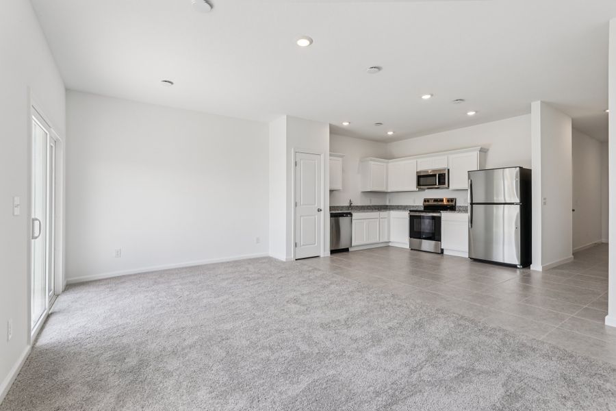 Representative unfurnished interior of a home built from the Pulsar by Starlight Homes in Aster Towns, Summerville (Image 16).