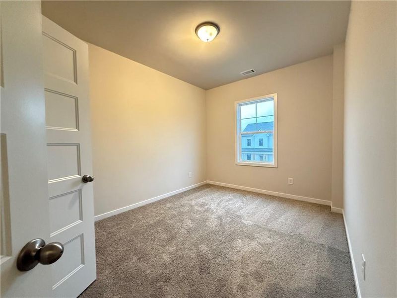 Spacious, unfurnished interior of a new home in Ponderosa Farms Manor, Gainesville (Image 29).