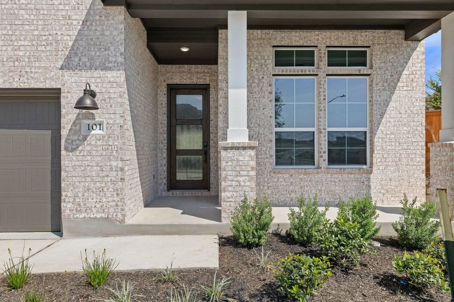 Exterior details and patio area of a home in Lariat, Liberty Hill (Image 3). Exterior details and patio area of a home in Lariat, Liberty Hill (Image 3).