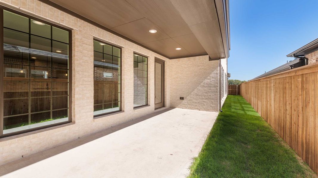 Exterior details and patio area of a home in The Parks at Wilson Creek, Celina (Image 3).