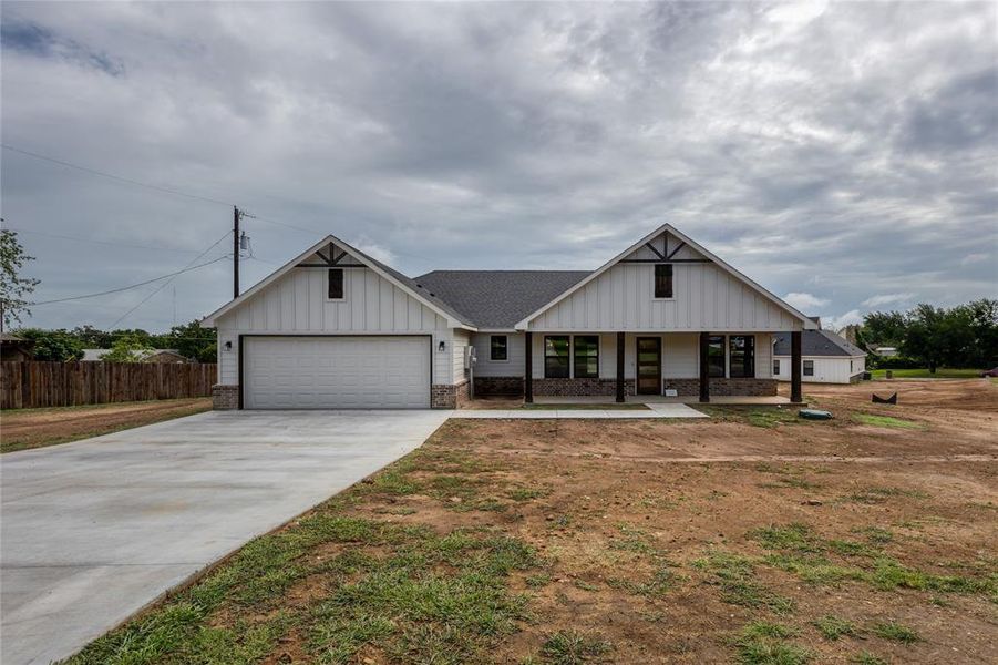 Front exterior of a new home in , Jacksboro, TX, highlighting curb appeal (Image 2).