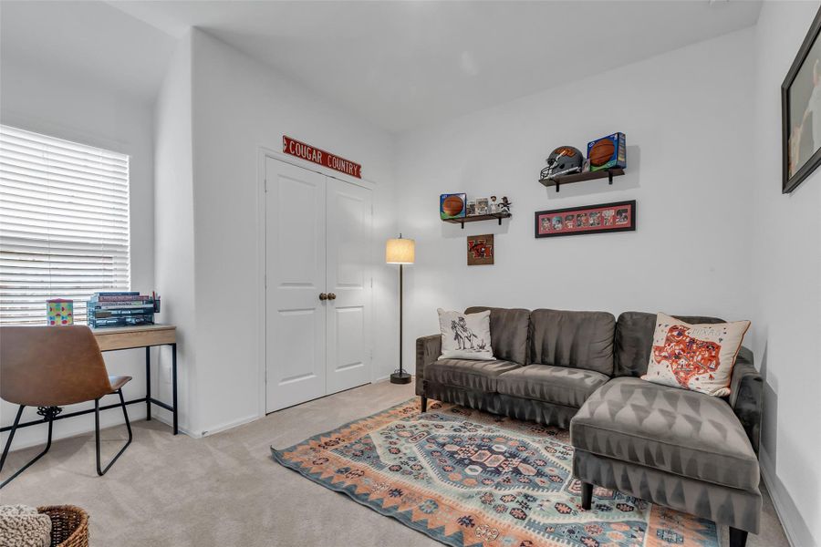 Here's the third bedroom currently being used as an extra TV/reading room and home office.