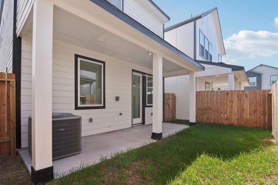 Exterior details and patio area of a home in Spring Brook Village - City Series, Houston (Image 25). Exterior details and patio area of a home in Spring Brook Village - City Series, Houston (Image 25).