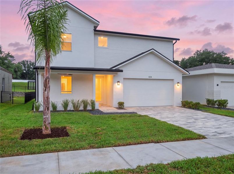 Front exterior of a new home in , Lady Lake, FL, highlighting curb appeal (Image 26). Front exterior of a new home in , Lady Lake, FL, highlighting curb appeal (Image 26).