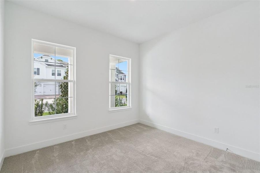 Spacious, unfurnished interior of a new home in Northlake At Ovation, Winter Garden (Image 19).