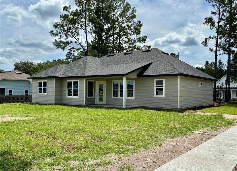 Front exterior of a new home in , High Springs, FL, highlighting curb appeal (Image 12).