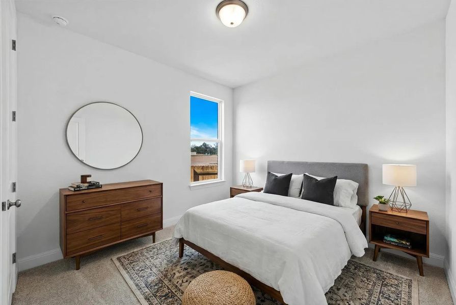 Furnished interior view inside a new home in The Colony - 50', Bastrop (Image 5).