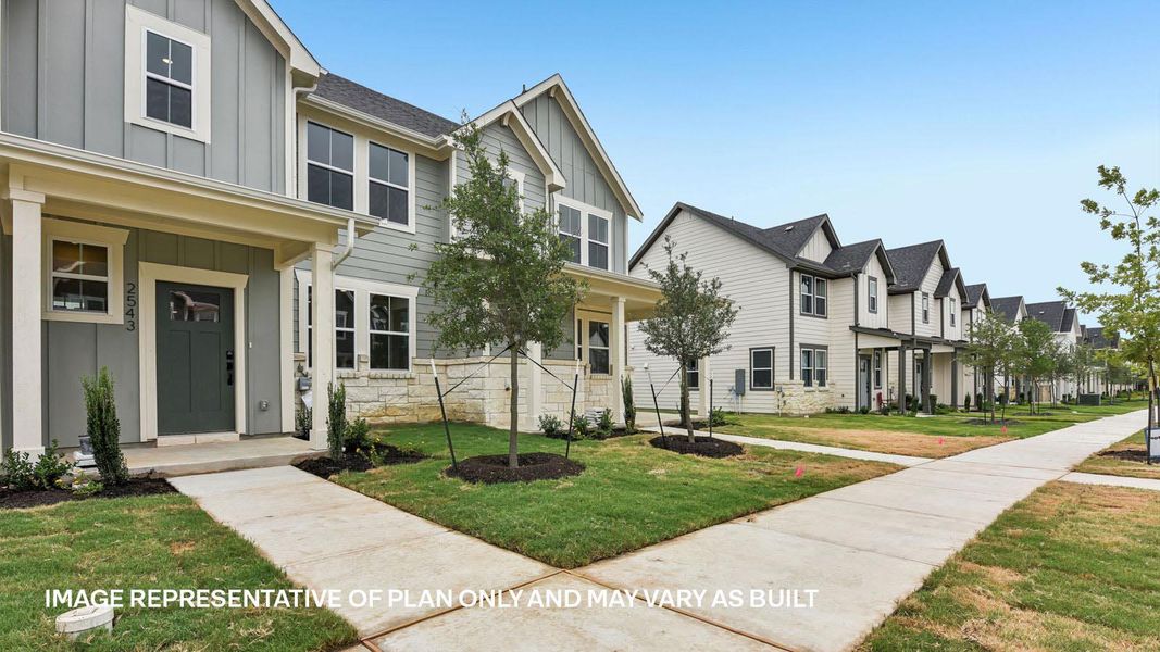 Front exterior of a new home in Avery Centre, Round Rock, TX, highlighting curb appeal (Image 24). Front exterior of a new home in Avery Centre, Round Rock, TX, highlighting curb appeal (Image 24).