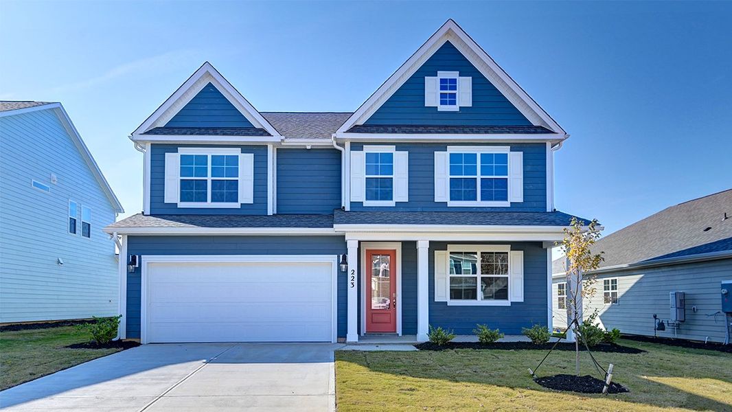 Front exterior of a new home in Livingston Woods, Irmo, SC, highlighting curb appeal (Image 1). Front exterior of a new home in Livingston Woods, Irmo, SC, highlighting curb appeal (Image 1).