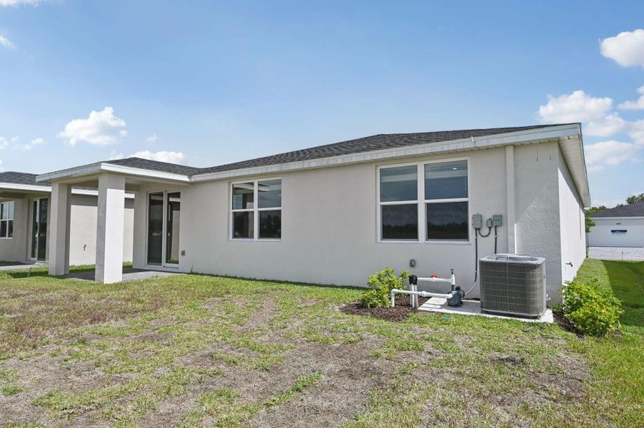 Exterior details and patio area of a home in Hampton Park - Classic Series, Vero Beach (Image 20).