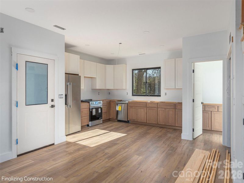 Furnished interior view inside a new home in , Waynesville (Image 4).