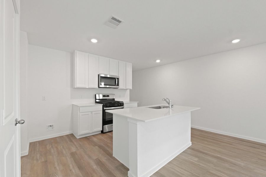Furnished interior view inside a new home in The Canopies, Splendora (Image 3).