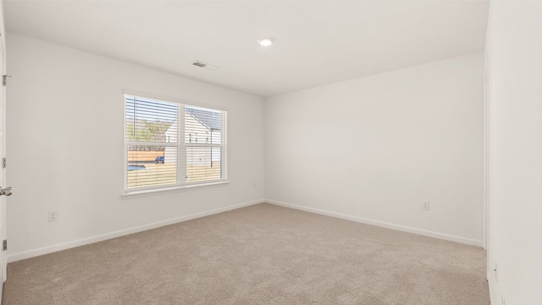 Representative unfurnished interior of a home built from the Edison by D.R. Horton in Heritage Pointe, Senoia (Image 27).