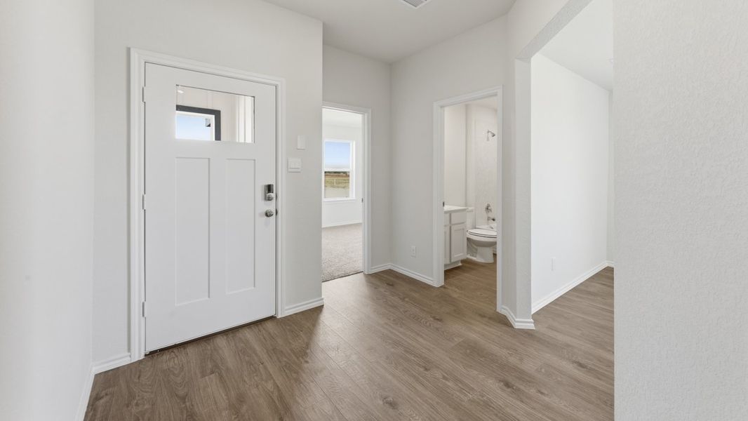 Representative unfurnished interior of a home built from the Learjet by D.R. Horton in Windrose, Pilot Point (Image 7).
