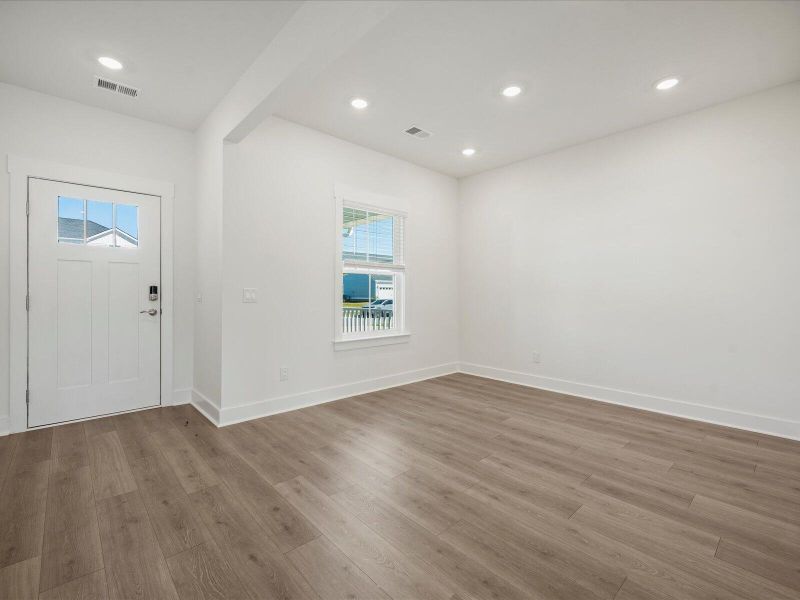 Spacious, unfurnished interior of a new home in The Coves at Lakes of Cane Bay II, Summerville (Image 17). Spacious, unfurnished interior of a new home in The Coves at Lakes of Cane Bay II, Summerville (Image 17).