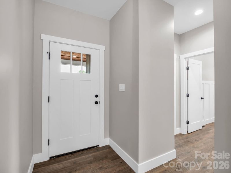 Foyer and front door (all doors and windows are insulated!). There is extra insulation throughout the entire home. Foyer and front door (all doors and windows are insulated!). There is extra insulation throughout the entire home.