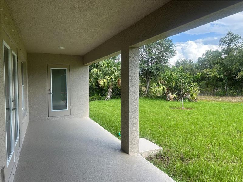 Exterior details and patio area of a home in Deep Creek, Punta Gorda (Image 4).