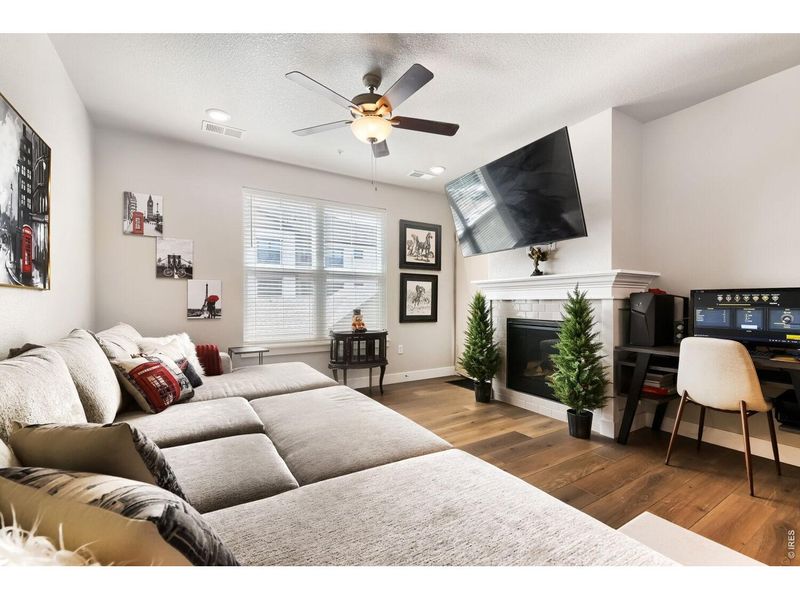 Furnished interior view inside a new home in Highlands at Fox Hill - The Flats, Longmont (Image 6).
