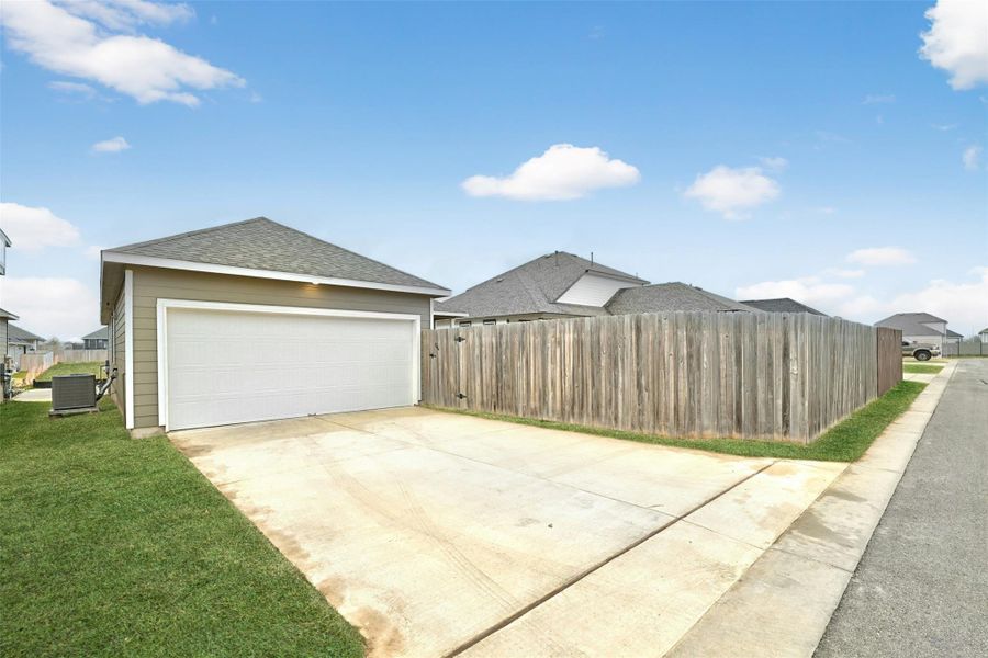 Garage with driveway Garage with driveway