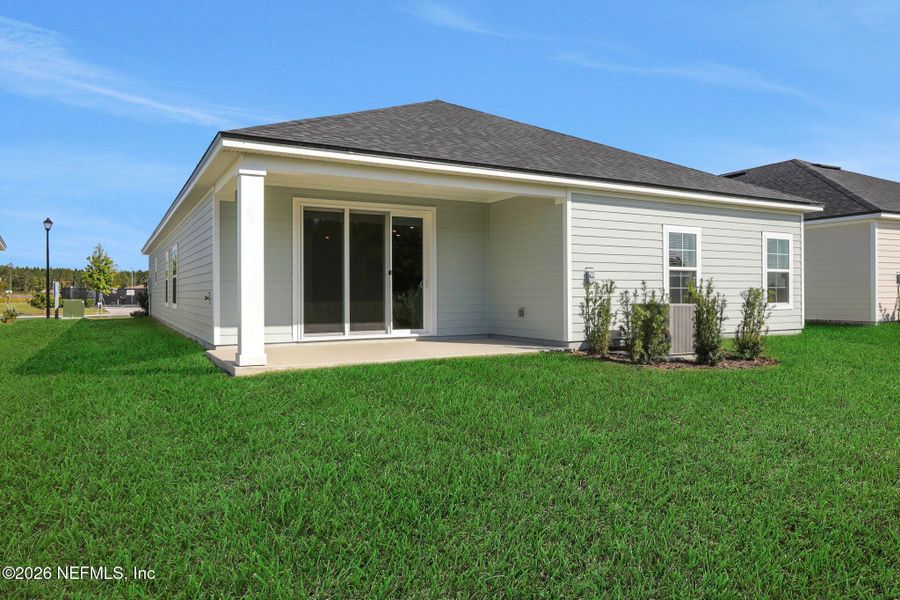 Exterior details and patio area of a home in Amberly, Green Cove Springs (Image 27).